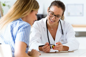 woman talking to doctor