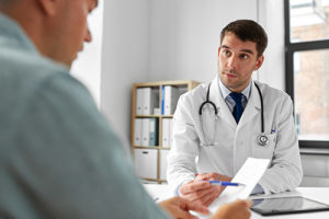 man talking to doctor
