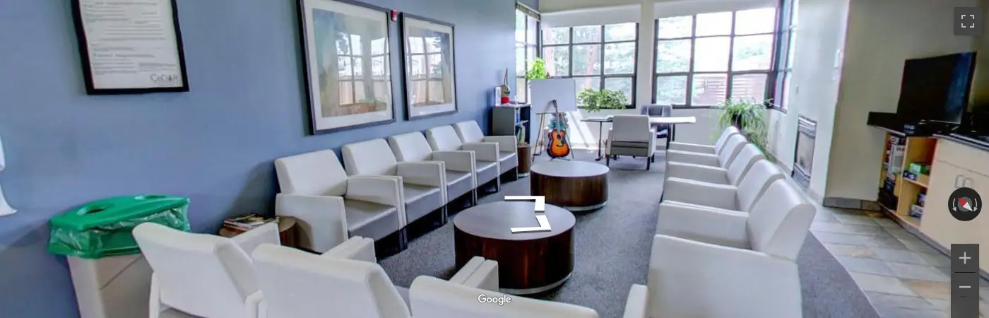 Residential Cottage with Nice Chairs and Guitar